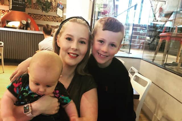 Riley Quinn with his mum, Emily Brooke, and little brother, Rory