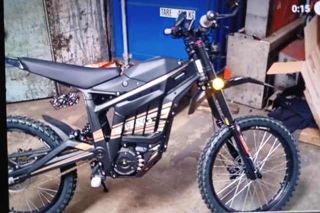A man was knocked off his motorboike and robbed on Haggstones Road, near Oughtibridge. Police have issued this picture of his Talaria Sting motorcycle as part of their investigation