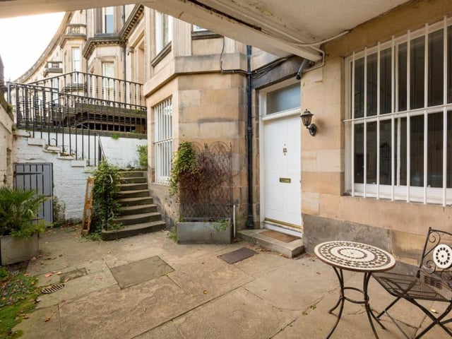 Private gated courtyard to the front.
