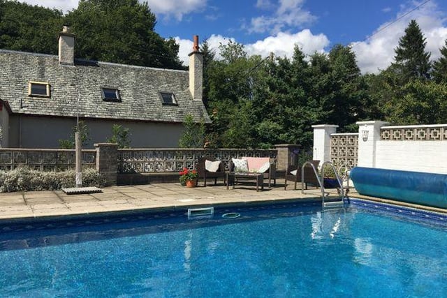 A former coach house, this family home is situated in the popular Perthshire village of Birnam and comes with a ten metre by five metre outdoor heated swimming pool. Available for offers over 399,999 GBP