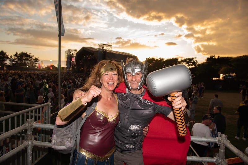 Becky Ferris as Wonder Woman and Anthony Volz as Thor while Reef play the Castle Stage. Picture: Vernon Nash (280821-171)