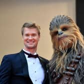 At 6ft 11 inches tall you won’t be able to miss Finnish actor Joonas Suotamo, who plays Chewbacca (or ‘Chewie’ to his friends). Joonas originally joined the Star Wars universe playing a body double for Peter Mayhew in The Force Awakens before completely taking over the role in The Last Jedi and Solo. (Photo credit ALBERTO PIZZOLI/AFP via Getty Images)