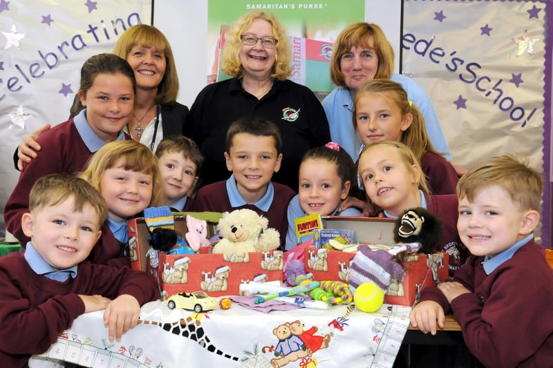 St Bede's pupils help launch the 2014 Operation Christmas Child shoebox appeal, with Carol Hall, centre, headteacher Moria Rooney, left, and Trish Octon. Remember this?