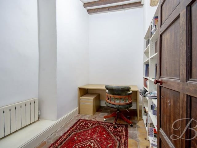 This windowless room is currently used as an office.