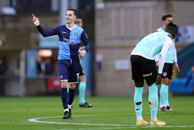 Anis Mehmeti of Wycombe Wanderers celebrates after scoring their sides first goal during the Sky Bet League One between Wycombe Wanderers and Portsmouth at Adams Park on December 04, 2022 in High Wycombe, England. (Photo by Alex Morton/Getty Images)