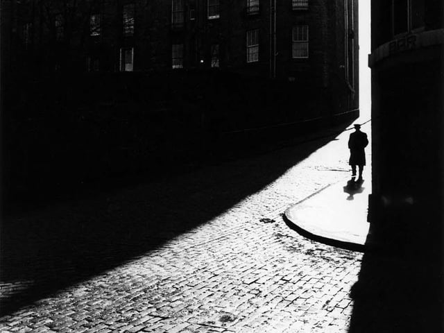 Long shadows and a lone figure at India Place.