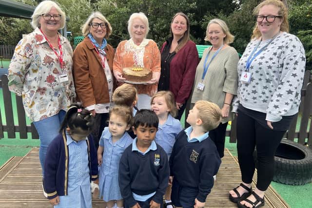 Clare Gleadall, Mairead Shipley, Jeannie Fojut, Kirsty Holland, Bernie Pathe and Valerie Clarke, with children from Mylnhurst Nursery