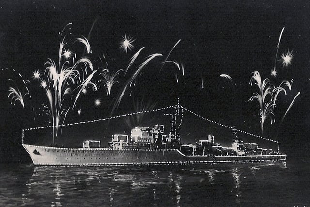 The fleet lit up for the Coronation fleet review at Spithead in 1953.