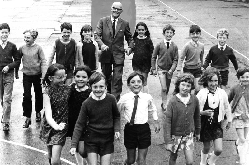 Pupils of Cleadon Park Junior School with their headmaster Philip Ward, who retired after 15 years at the school in 1971.