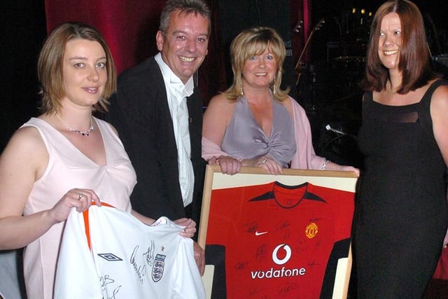 Pictured at the Magna Science centre where a charity ball was held for the Sheffield Children's hospital. Seen with signed England and Manchester United FC Shirts that were to be auctioned are, left to right, Marie Hadfield, Dave Kilner, Gillian Casey, and Jayne Fisher, May 2005
