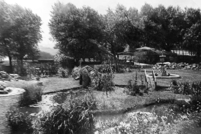 The water garden, HMS Excellent, Whale island. Long lost in time, here we see the water gardens and aviary located at Whale island, HMS Excellent before the last war.