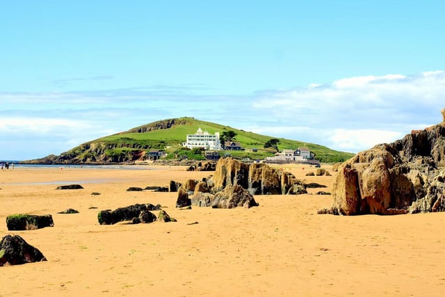 Broad Sands Beach is nestled in wooded cliffs and is home to secret caves which are waiting to be explored. There’s also an island lookout which is great for children, with a pathway made up of 200 steps leading down to the sandy beach (Photo: Shutterstock)