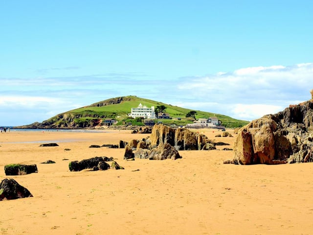 Broad Sands Beach is nestled in wooded cliffs and is home to secret caves which are waiting to be explored. There’s also an island lookout which is great for children, with a pathway made up of 200 steps leading down to the sandy beach (Photo: Shutterstock)