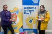 Rebecca (left) presented gifts to the Children's Hospital Charity