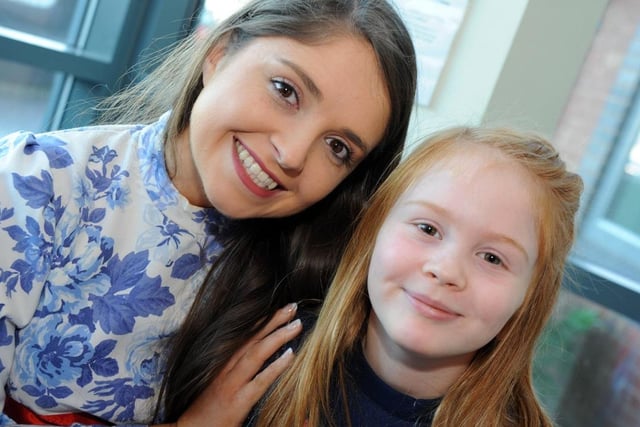 Wendy with seven-year-old Grace Lowry in 2014 when the cast of Peter Pan played a visit to the Nightingale Ward.