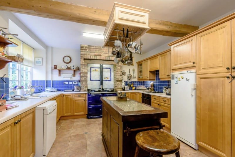 The kitchen is well proportioned space and has a double oven , oil-fired range cooker separate hob, plumbing for washing machine and spacious utility area.
