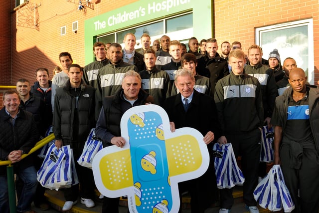 Manager Dave Jones, chairman Milan Mandaric and the Owls first team squad and coaching staff at Sheffield Children's Hospital in 2012.