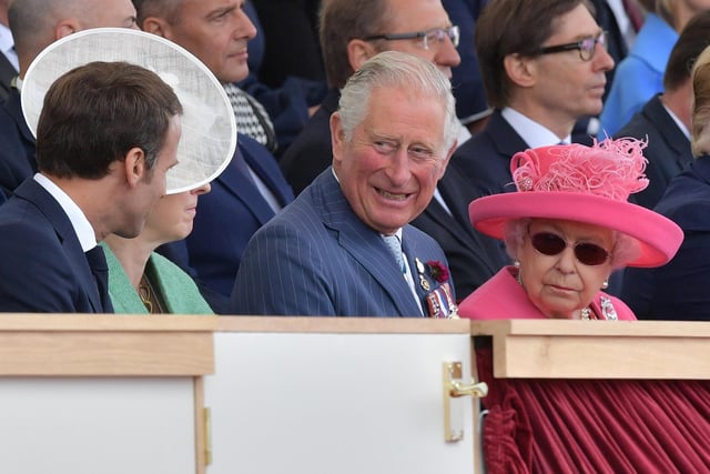 French President Emmanuel Macron (L), Theresa May, Prince Charles, Prince of Wales and Britain's Queen Elizabeth II attend the event. Picture: DANIEL LEAL-OLIVAS/AFP/Getty Images