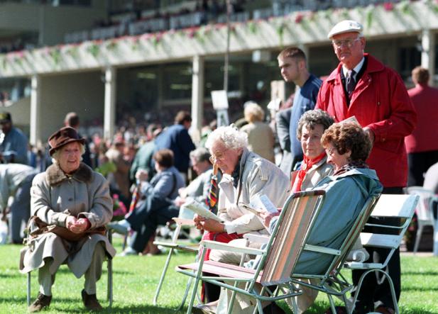 Race goers enjoy the last of the Summer sun at the 1997 races.