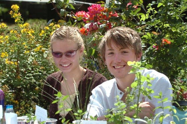 Harriet Hemsphall and Sam Bradwell from Lady Manners school Green Group, Bakewell, at their stall at the Green Fair at St Marys Church, Bramall Lane in 2005