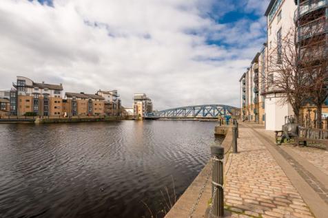 This two-bedroom flat is on the market with Sturrock, Armstrong and Thomson with an asking price of offers over £215,000