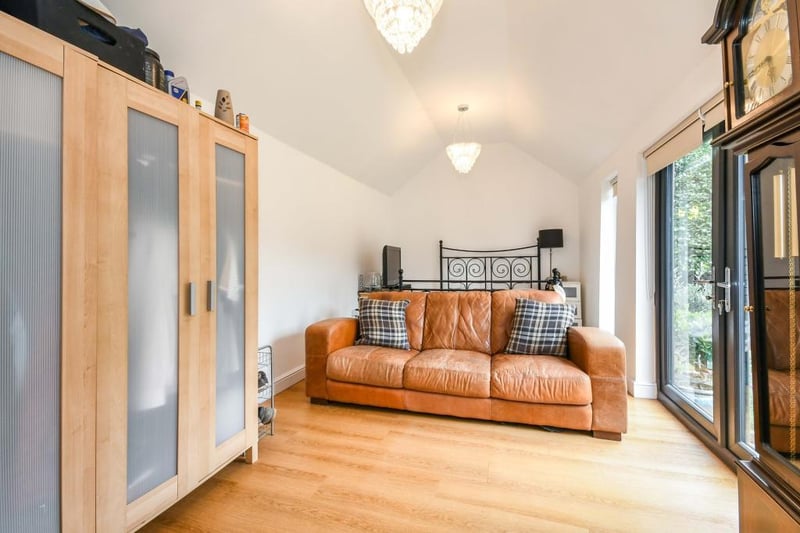 The main bedroom is an impressively sized room that would be perfect as a bedroom or a garden room as there are French doors out to the garden, bringing the outside in. There is LVT flooring and a double radiator, as well as access to an en suite.