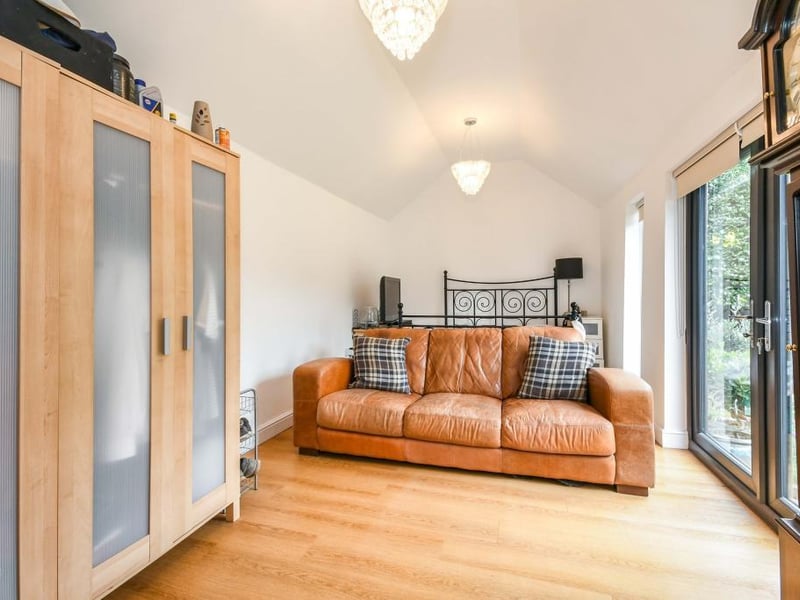 The main bedroom is an impressively sized room that would be perfect as a bedroom or a garden room as there are French doors out to the garden, bringing the outside in. There is LVT flooring and a double radiator, as well as access to an en suite.