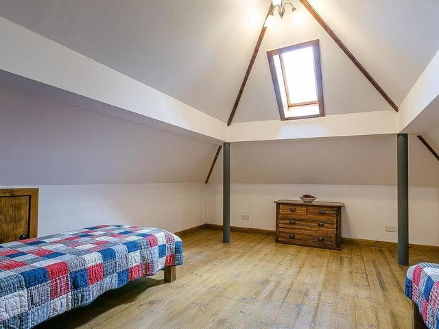 The second bedroom at Woodman's Cottage. Functional but cosy.