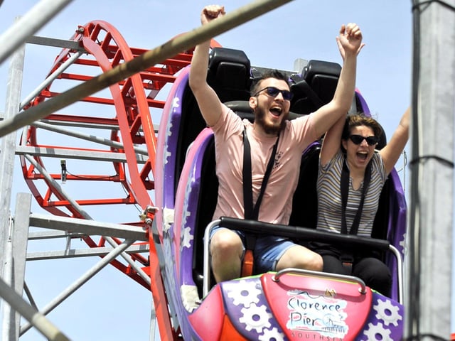 Vini Enculescu and his sister Abi from Londo enjoy one of the ride at Clarence Pier. Picture Ian Hargreaves (180720-1)