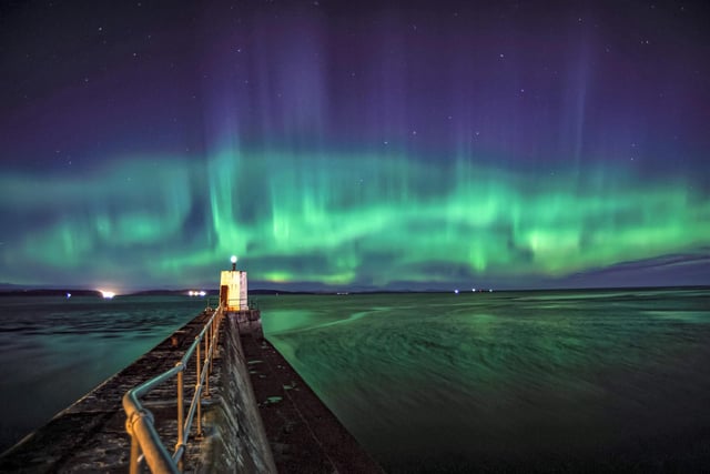 "This turned out to be one of the best shows of the merry dancers I’ve had the privilege to watch. The waves of aurora weaved and waved, pulsing across the sky. The lighthouse added a bit of foreground and added proportion to the height of the aurora pillars and curtains." Joss Ward, Nairn