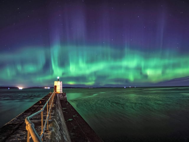 "This turned out to be one of the best shows of the merry dancers I’ve had the privilege to watch. The waves of aurora weaved and waved, pulsing across the sky. The lighthouse added a bit of foreground and added proportion to the height of the aurora pillars and curtains." Joss Ward, Nairn