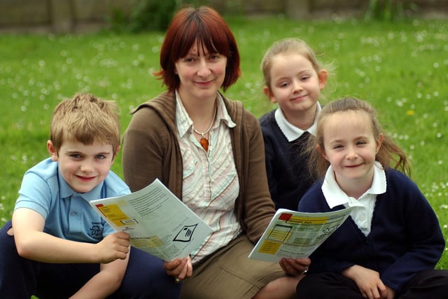 The school newspaper was being discussed by these students and teacher Claire Fawcett at Downhill Infants in 2004. Does this bring back memories?