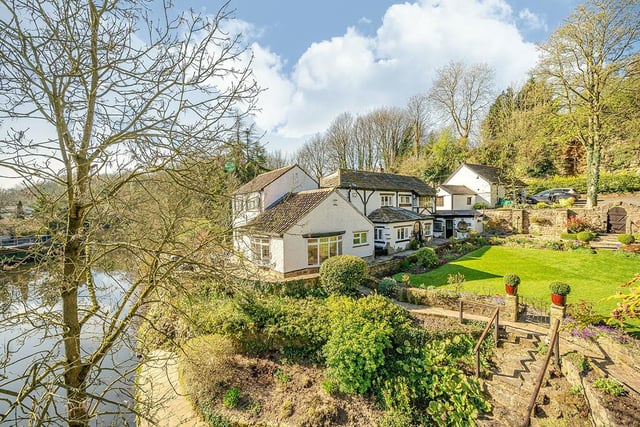 The property is located on Spital Croft in Knaresborough, and occupies a riverside position with steps leading down to the River Nidd.