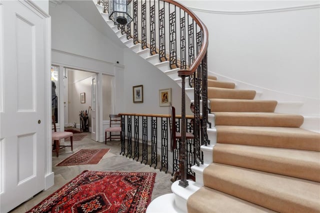 This 7 bedroom four storey entire Georgian townhouse with a south west facing garden, in the much sought after central location of Stockbridge has offers of over £1,950,000. 
It retains many attractive period features, including the original flagstone floors, working shutters, astragal windows and ornate plaster work (Savills).