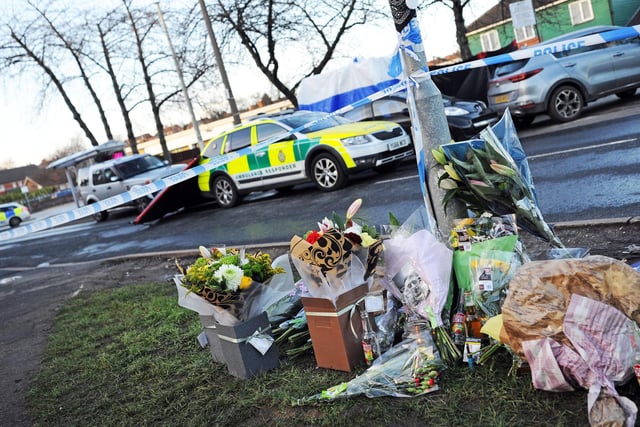 Floral Tributes laid at Wath Road, Mexborough. Picture: NDFP-12-01-21-WathRdTributes 2-NMSY