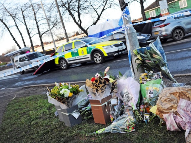 Floral Tributes laid at Wath Road, Mexborough. Picture: NDFP-12-01-21-WathRdTributes 2-NMSY