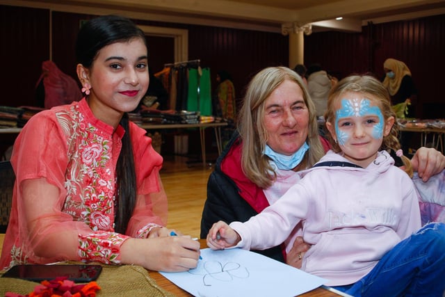 Sabah does some arts and crafts with four-year-old Skye and her gran, Francis, from Stenhousemuir.