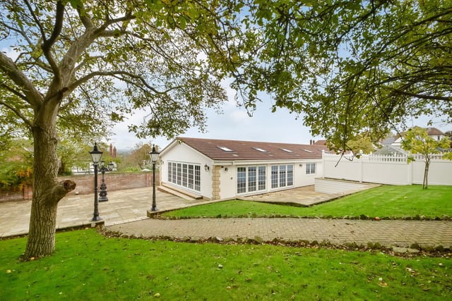 This huge five-bedroom Portsdown Hill home in Portsmouth is up for raffle. Pictured is the property's 7.58m x 8.86m heated pool house, at the bottom of the garden.