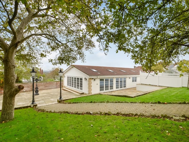 This huge five-bedroom Portsdown Hill home in Portsmouth is up for raffle. Pictured is the property's 7.58m x 8.86m heated pool house, at the bottom of the garden.