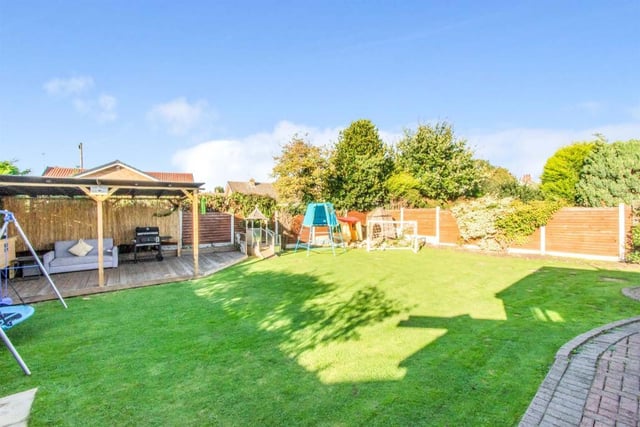 To the rear of the property is a generous enclosed lawned garden with patio, area for a hot tub and area for a gazebo. There is an outside tap.
Garage 14' 7" x 8' 5" ( 4.45m x 2.57m )
Home Office 8' 10" x 8' 2" ( 2.69m x 2.49m )
Positioned to the rear of the garage with a partition wall. There is a rear facing double glazed window and a rear facing door.