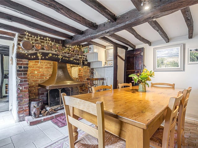 This three bedroom Grade II listed thatched cottage in Nether Wallop is on the market for £900,000. It is listed by Fine and Country.