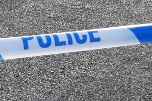 Five people were taken to hospital last night after being injured in a car crash which closed a major route into Sheffield for nearly three hours. File picture shows police tape.