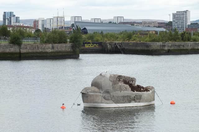 The Floating Head by Richard Groom starts off the trail. It can be found in the Canting Basin next to the Glasgow Science Centre.