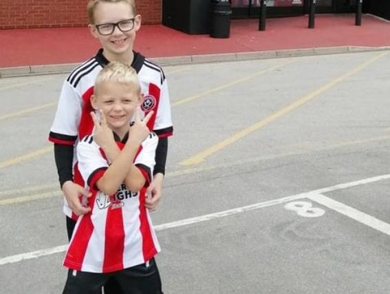 "My United mad boys, Austin and Parker, at the Lane," says mum Jayne Linley.