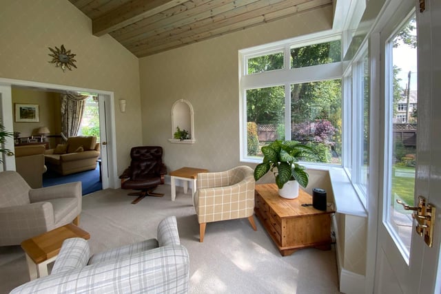 The garden room, accessed by sliding doors from the sitting room.