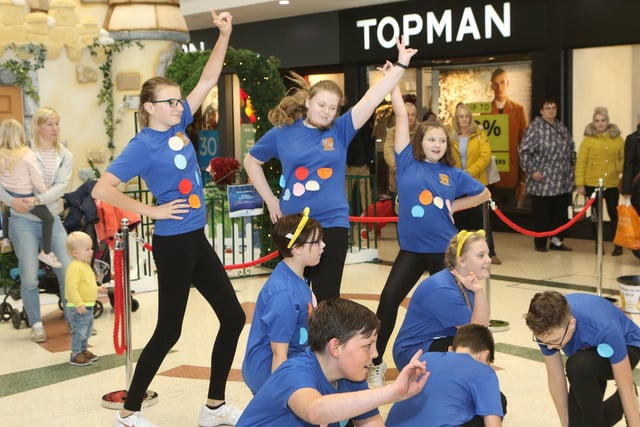 The dancers from Queen Elizabeth School school drop into the Four Seasons Shopping Centre and performed outside Topman in 2019