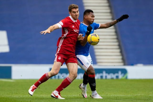 Morelos v Tommie Hoban was not quite as physical a battle as he was used to with Scott McKenna, but Rangers strikr dropped deep to help out taking him out of goalscoring positions occupied by Roofe.