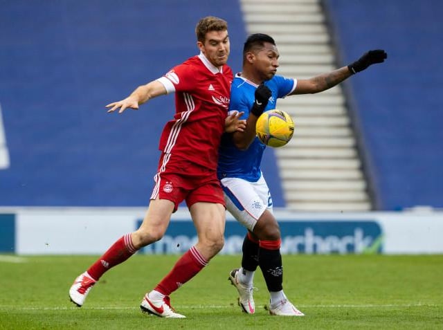 Morelos v Tommie Hoban was not quite as physical a battle as he was used to with Scott McKenna, but Rangers strikr dropped deep to help out taking him out of goalscoring positions occupied by Roofe.