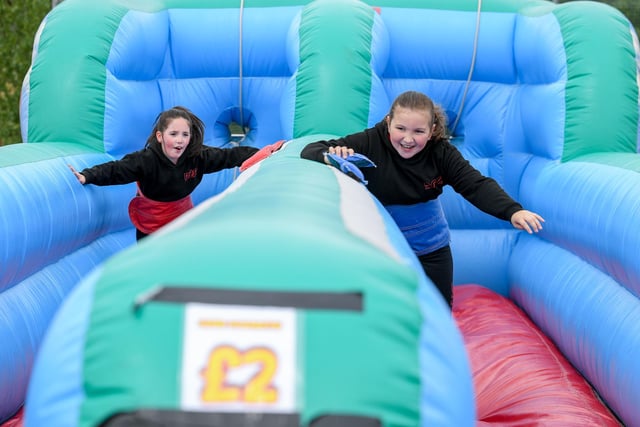 Friends Olivia Hill (9) from Grangemouth and Aimee Stewart (10) from Falkirk have fun on the bouncy bungee.