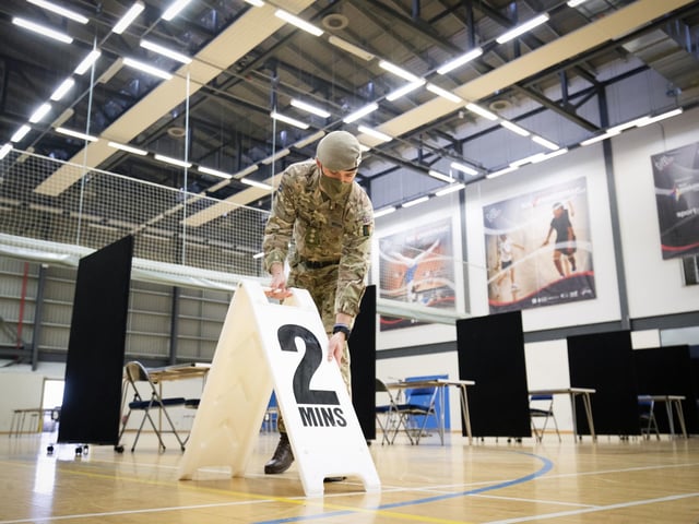 Members of the Royal Scots Dragoon Guard carry out a reconnaissance before setting up a Covid–19 vaccination centre at the Ravenscraig Regional Sports Facility in Motherwell